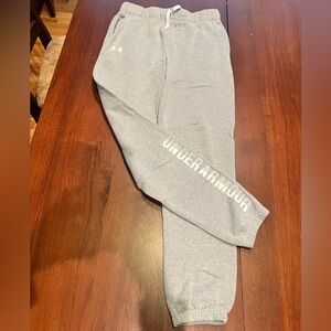 Under Armour gray youth joggers. Size YL. White lettering on leg.